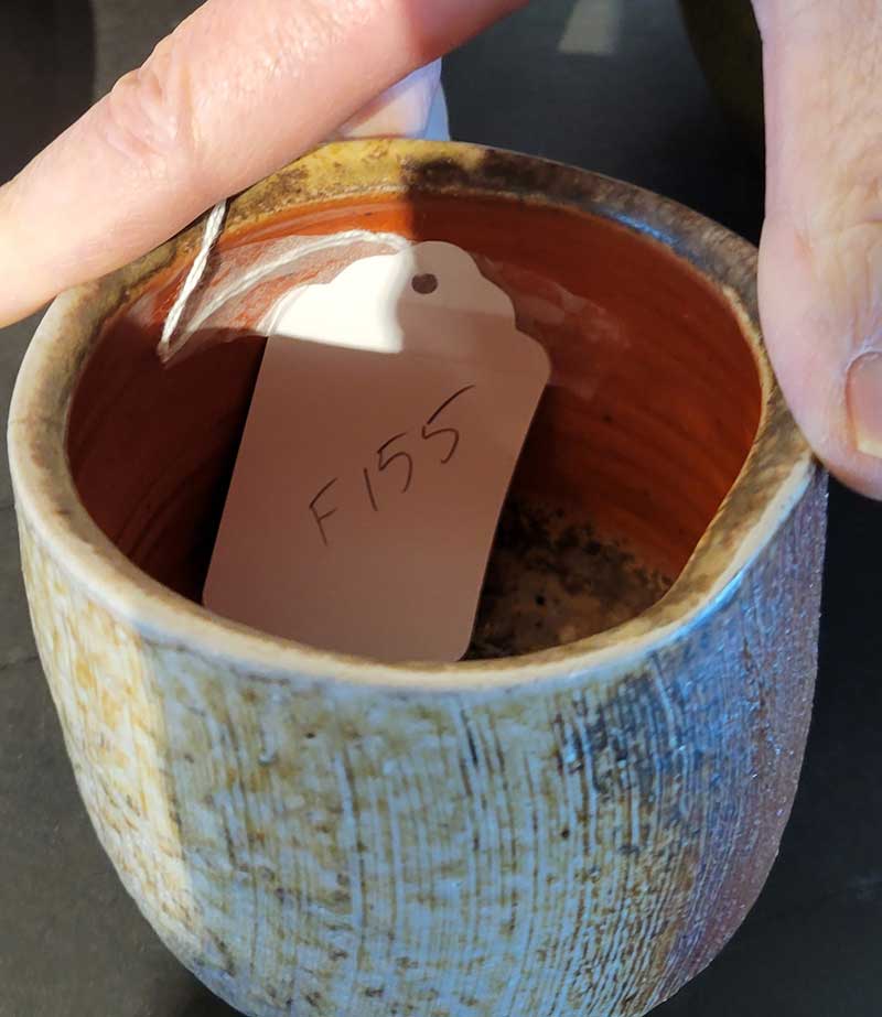 small clay mug